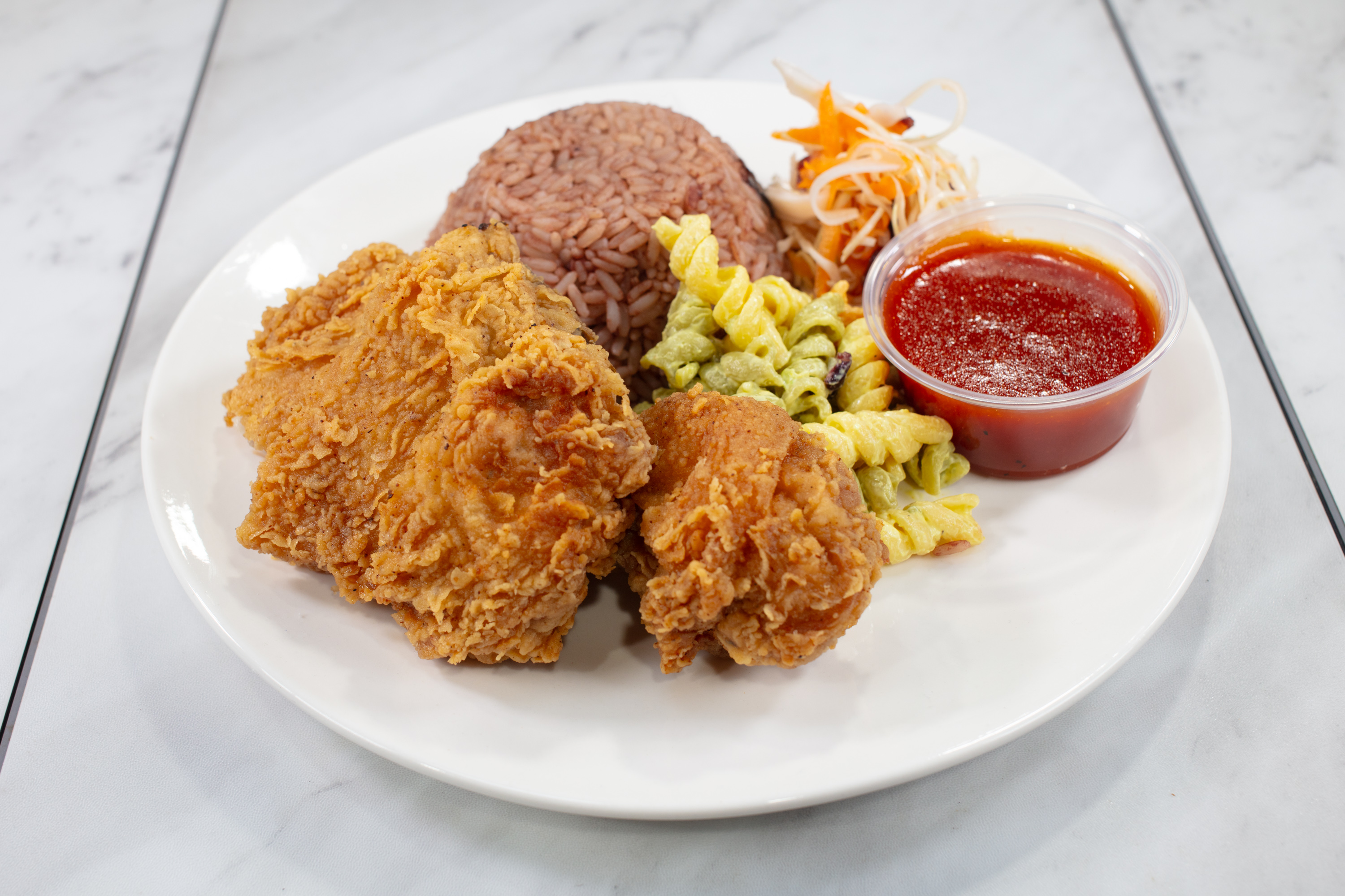 Fry chicken meal with rice and sides